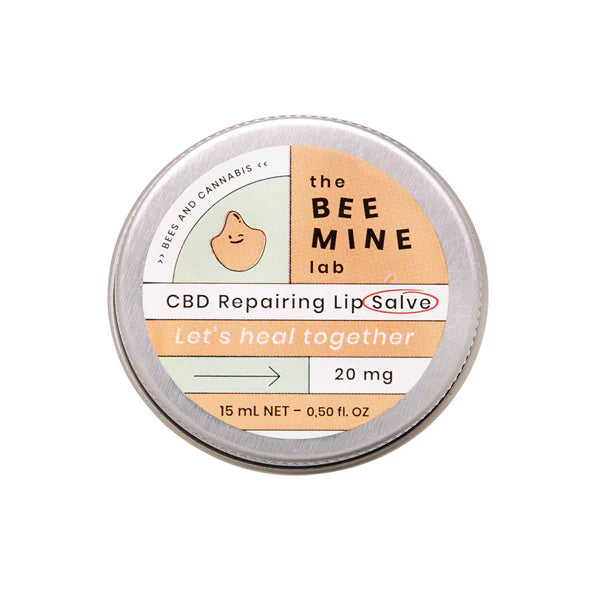CBD repairing lip salve tin labeled 'the BEE MINE lab' on a white background