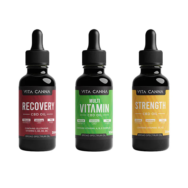 Three bottles of Vita Canna CBD Oil on a white background