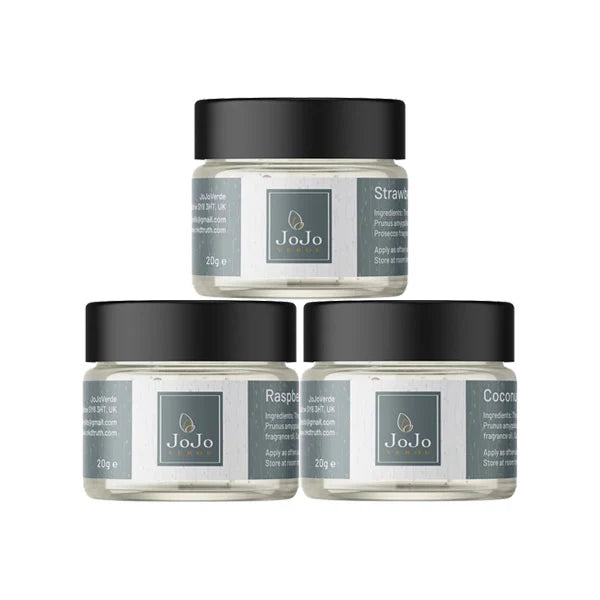 Three jars of JoJo cream with black lids on a white background